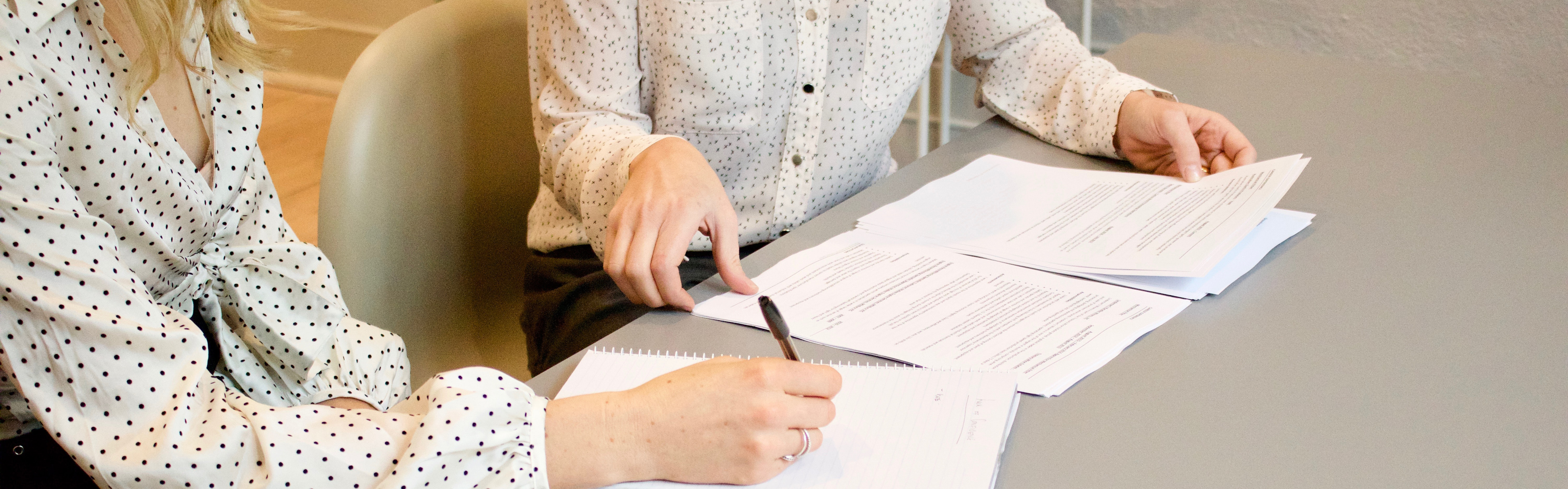 people reviewing documents